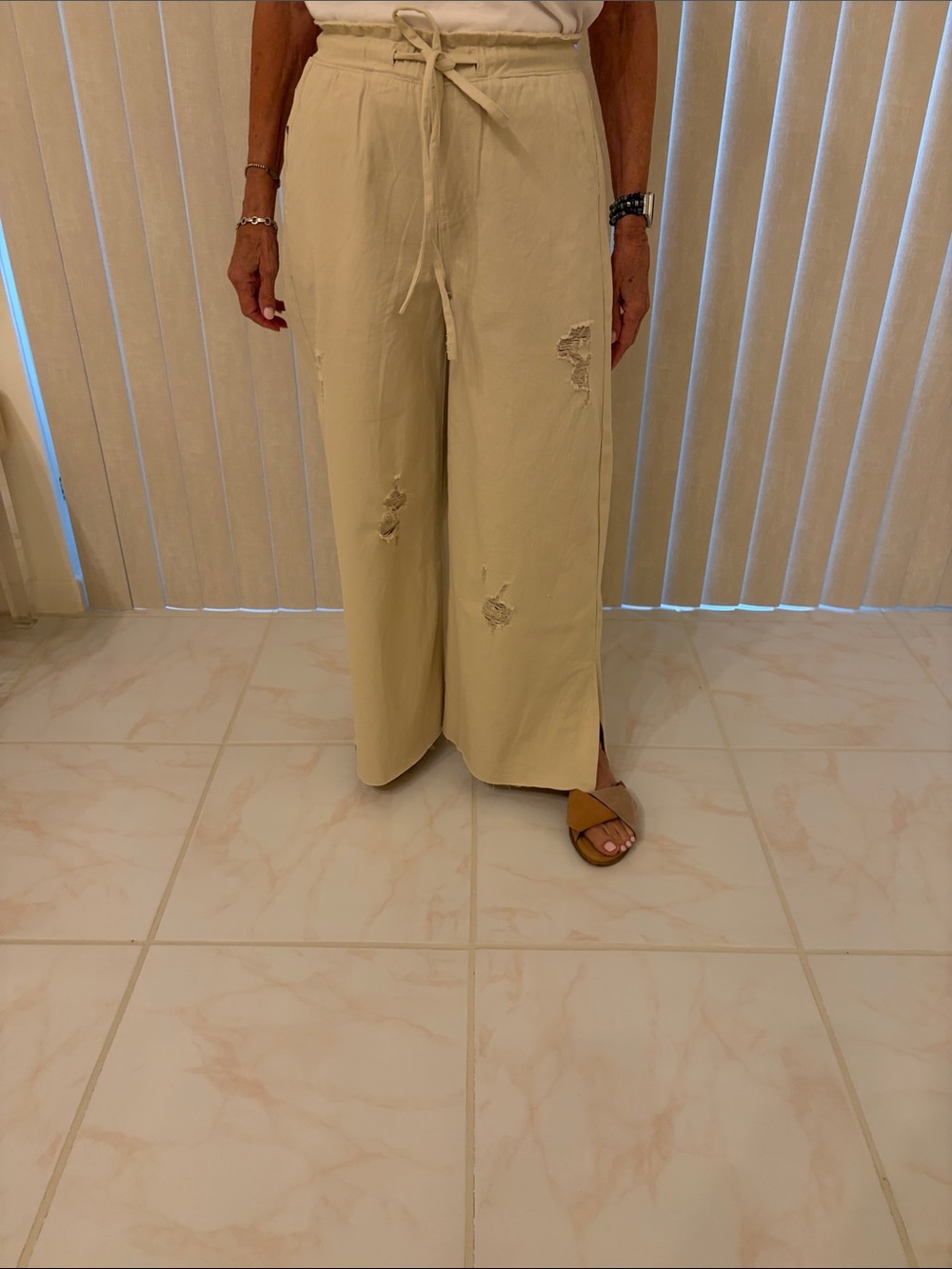 POL Cream Distressed Wide Leg Drawstring Pants
Size Small.